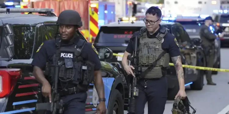 Atlanta Shooting Near CDC Leaves Police Officer and Suspected Gunman Dead - AP Photo/Mike Stewart