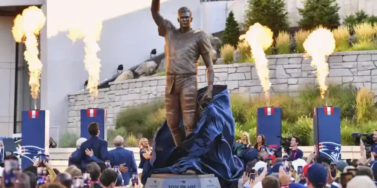 Tom Brady Immortalized: Patriots Reveal Six-Ton Bronze Statue Honoring Six Super Bowl Championships and 20 Seasons of Greatness - AP Photo/Steven Senne