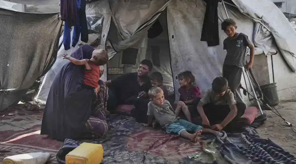 Displaced and Hungry: Gaza Parents Fight to Feed Six Children Amid War - AP Photo/Jehad Alshrafi