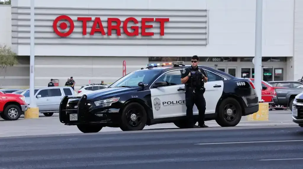 Three Killed, Including Child, in Austin Target Parking Lot Shooting; Police Capture Armed Suspect - AP Photo/Stephen Spillman