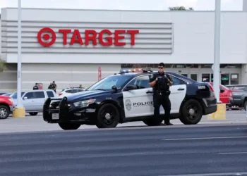 Three Killed, Including Child, in Austin Target Parking Lot Shooting; Police Capture Armed Suspect - AP Photo/Stephen Spillman