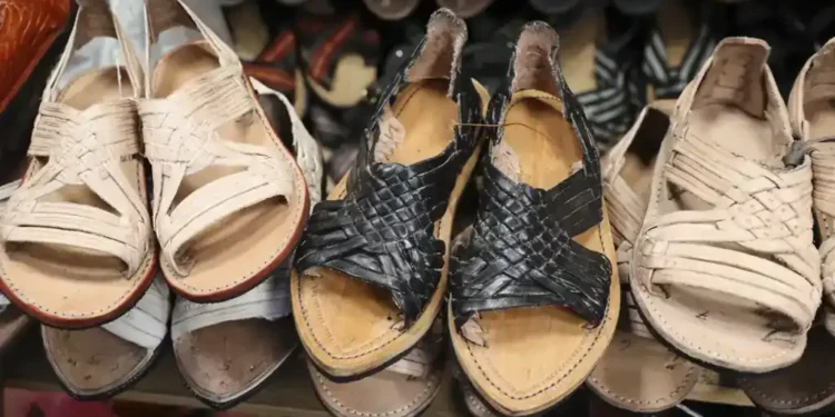 Adidas and Designer Willy Chavarria Issue Apologies Over Sandal Design Criticized for Copying Zapotec Huarache Style Without Consent - AP Photo/Luis Alberto Cruz