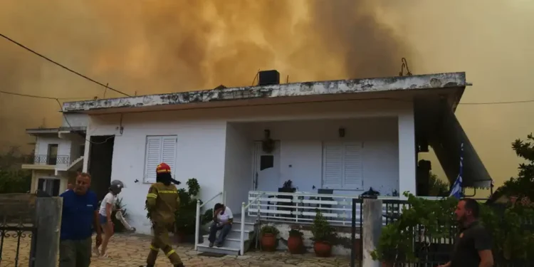 Greece, Spain, Turkey, and Albania Battle Deadly Wildfires as Thousands Evacuate Homes Amid Record Mediterranean Temperatures - AP Photo/Thanassis Stavrakis