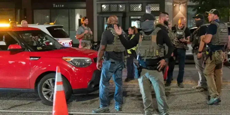 Federal Law Enforcement Patrols Intensify in D.C., Sparking Resident Protests Over Trump Administration Police Takeover - AP Photo/Jose Luis Magana
