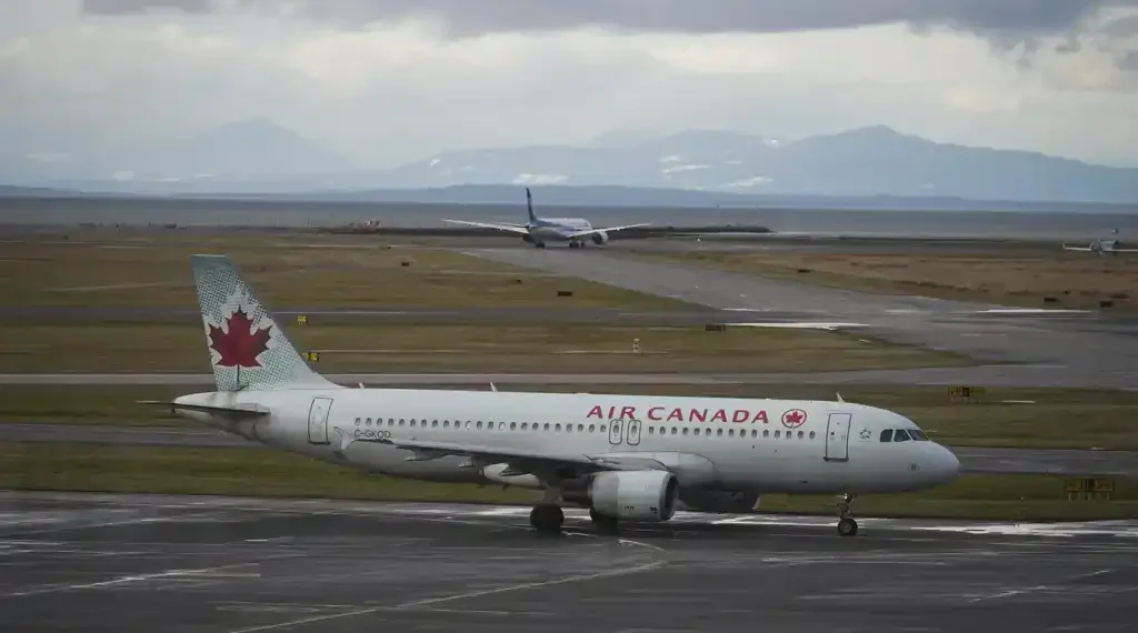 Canada’s Largest Airline to Suspend All Flights by Weekend as Air Canada Flight Attendants Move Closer to Nationwide Strike Action - Darryl Dyck/The Canadian Press via AP, File