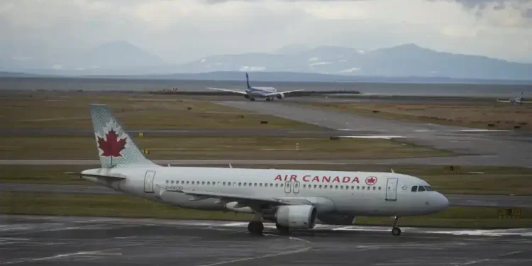 Canada’s Largest Airline to Suspend All Flights by Weekend as Air Canada Flight Attendants Move Closer to Nationwide Strike Action - Darryl Dyck/The Canadian Press via AP, File