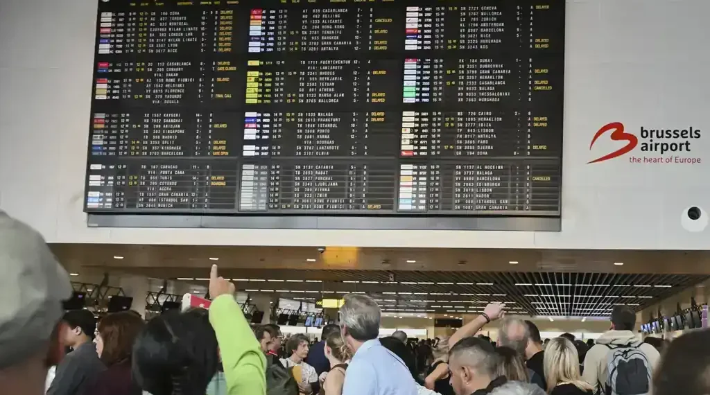 Cyberattack Disrupts Check-In Systems at Brussels, Berlin, and London Airports, Causing Flight Delays and Manual Boarding Measures - AP Photo/Harry Nakos