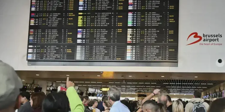 Cyberattack Disrupts Check-In Systems at Brussels, Berlin, and London Airports, Causing Flight Delays and Manual Boarding Measures - AP Photo/Harry Nakos