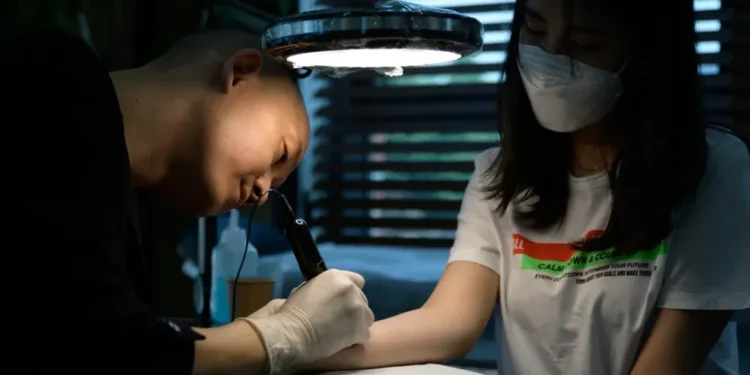 South Korea legalizes tattooing by non-medical professionals, ending 30-year ban with new licensing law for artists. - Getty Images