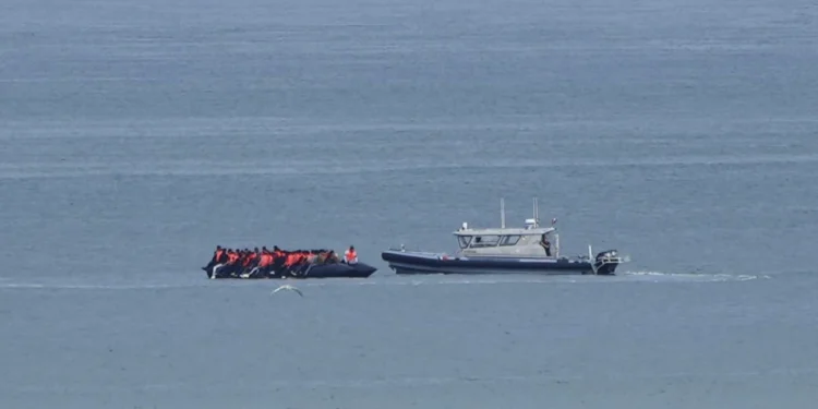 UK judge blocks first migrant deportation to France, delaying Starmer’s Channel crossings plan as trafficking claims spark legal review. - AP Photo/Nicolas Garriga, File