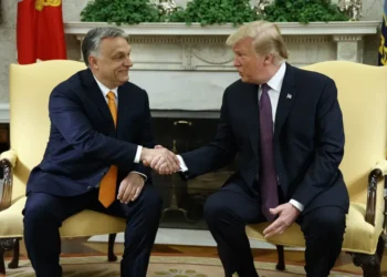 Trump applauds Jimmy Kimmel’s suspension as part of broader campaign against media, raising concerns of parallels with authoritarian tactics. - AP Photo/Evan Vucci, File