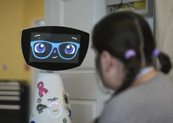 AI Robot Robin Comforts Pediatric Patients and Nursing Home Residents While Supporting Overworked Medical Staff in U.S. Hospitals - AP Photo/Damian Dovarganes