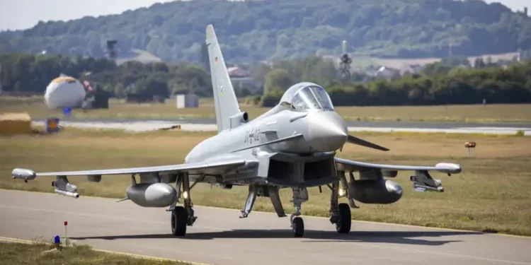 Russian IL-20 Surveillance Plane Intercepted by German Eurofighters and Swedish Gripens Over Baltic Sea in NATO Air Policing Operation - Daniel Karmann/dpa via AP, File