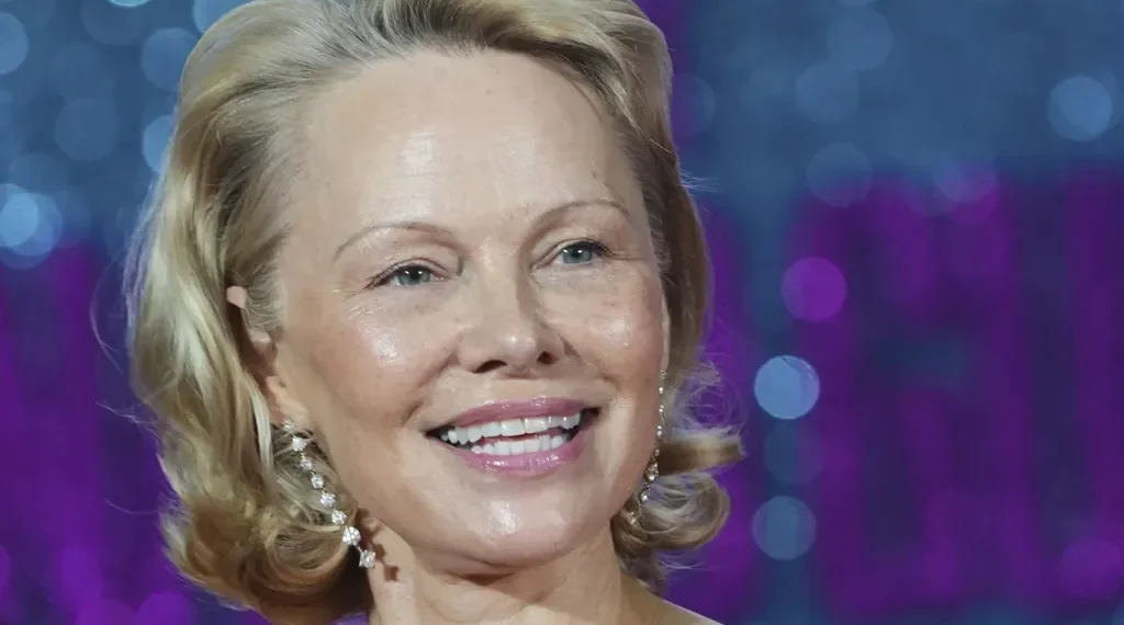 Pamela Anderson Inspires Women to Go Makeup-Free, Challenging Beauty Norms and Empowering Authentic Self-Expression - AP Photo/Kirsty Wigglesworth