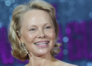 Pamela Anderson Inspires Women to Go Makeup-Free, Challenging Beauty Norms and Empowering Authentic Self-Expression - AP Photo/Kirsty Wigglesworth