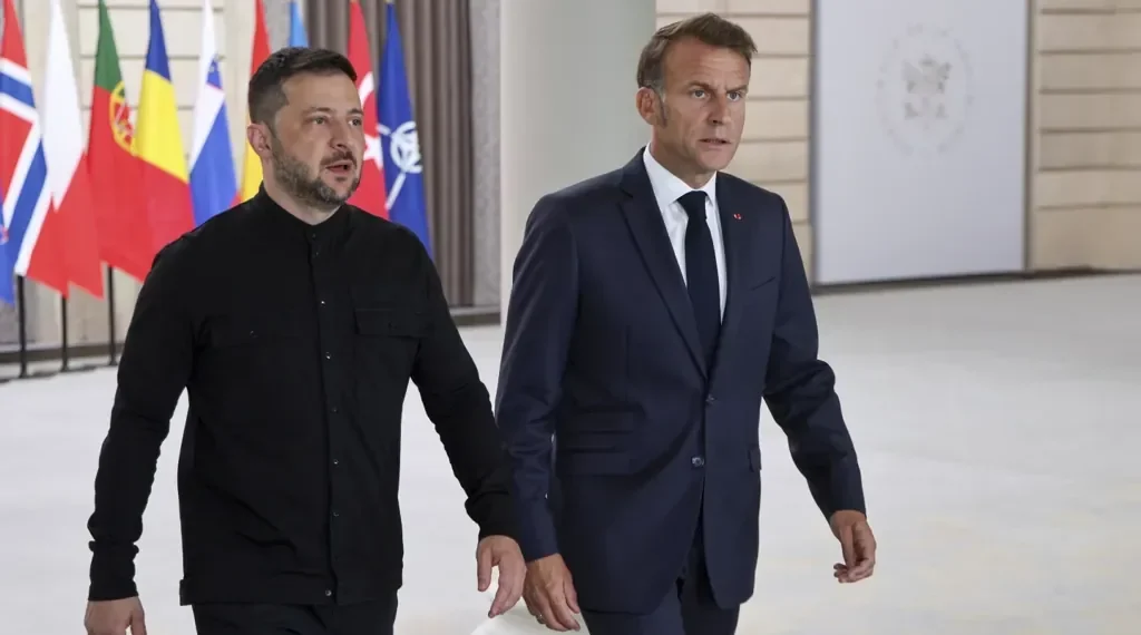 Macron says 26 nations pledge to join post-war reassurance force in Ukraine, with U.S. support under discussion to strengthen long-term security. - Ludovic Marin/Pool Photo via AP