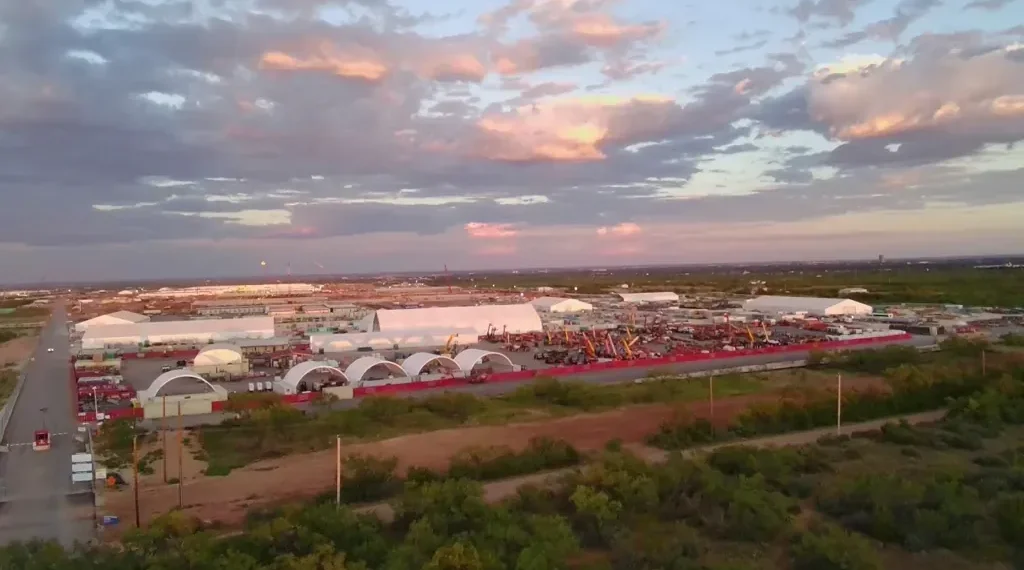 OpenAI opens Stargate AI center in Texas, announces five more sites with Oracle and SoftBank as part of $500B infrastructure push. - AP Photo/Matt O' Brien