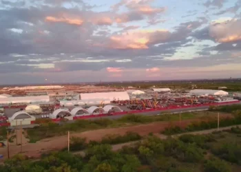 OpenAI opens Stargate AI center in Texas, announces five more sites with Oracle and SoftBank as part of $500B infrastructure push. - AP Photo/Matt O' Brien