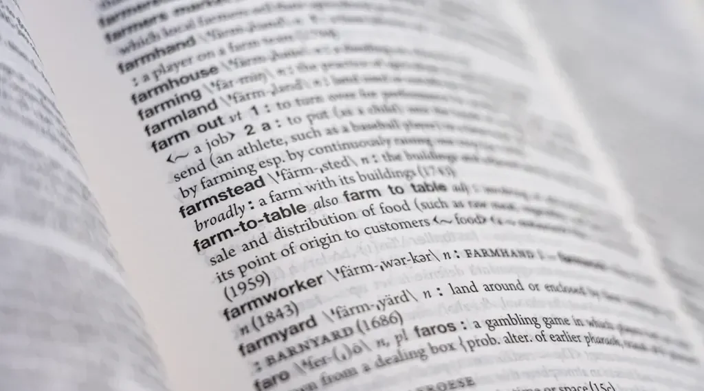 Merriam-Webster revises its Collegiate Dictionary, removing outdated entries while adding 5,000 new words and 20,000 fresh examples. - Merriam-Webster via AP