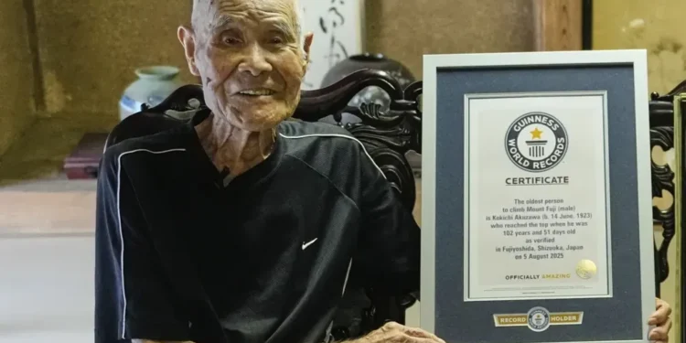 At 102, Kokichi Akuzawa Sets Guinness World Record as the Oldest Person to Reach the Summit of Japan’s Iconic Mount Fuji - AP Photo/Hiro Komae