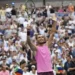 Alcaraz overpowers Djokovic 6-4, 7-6, 6-2 at U.S. Open semifinal, advancing to third straight major final in dominant performance. - AP Photo/Seth Wenig