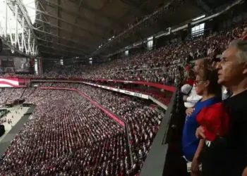 State Farm Stadium reaches capacity as tens of thousands honor Turning Point USA founder Charlie Kirk after his assassination. - Charly Triballeau/AFP/Getty Images