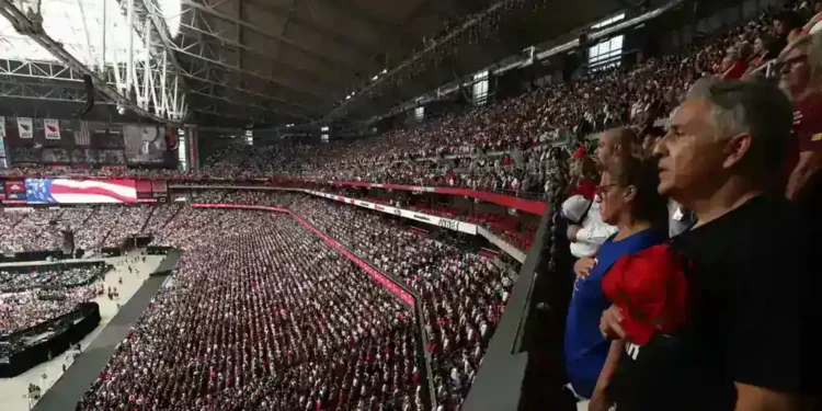 State Farm Stadium reaches capacity as tens of thousands honor Turning Point USA founder Charlie Kirk after his assassination. - Charly Triballeau/AFP/Getty Images