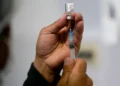 COVID-19 mRNA Vaccines May Boost Cancer Immunotherapy, Study Finds - AP Photo/Juan Karita, File
