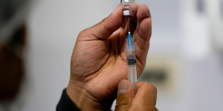 COVID-19 mRNA Vaccines May Boost Cancer Immunotherapy, Study Finds - AP Photo/Juan Karita, File