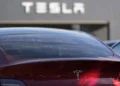 Tesla Launches Cheaper Model 3 and Model Y to Boost Slowing EV Sales - AP Photo/Mike Stewart, File
