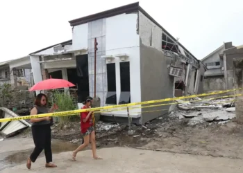 Twin Quakes Strike Southern Philippines, Killing Seven and Triggering Tsunami Alert - AP Photo/Manman Dejeto