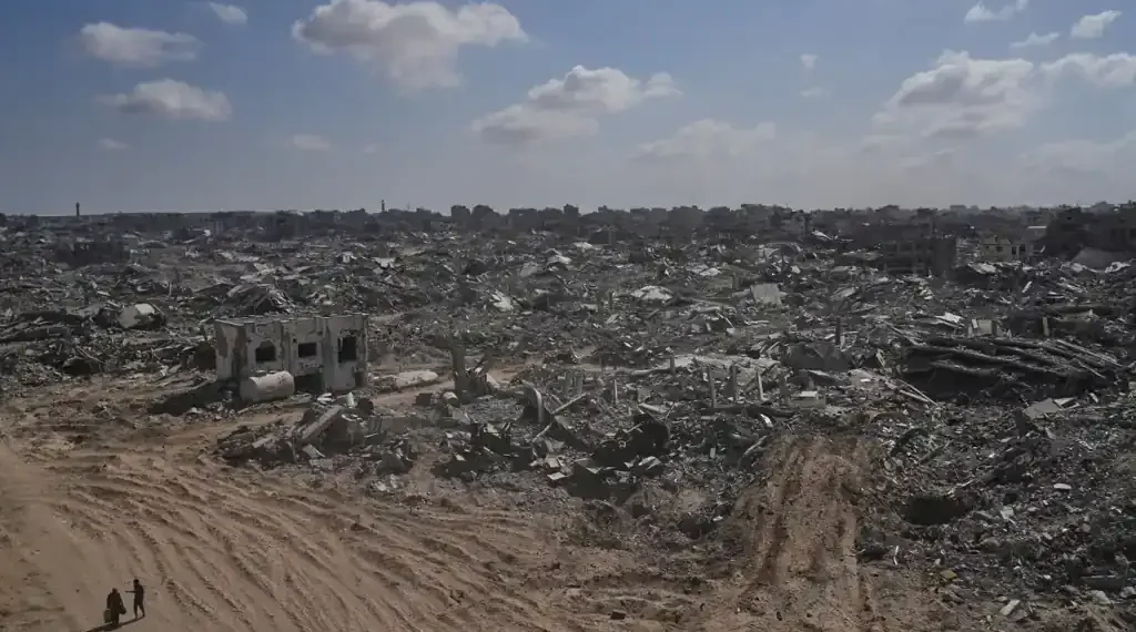 Gaza Ceasefire Holds as Palestinians Return to Ruins, Hostage Release Expected Monday - AP Photo/Abdel Kareem Hana