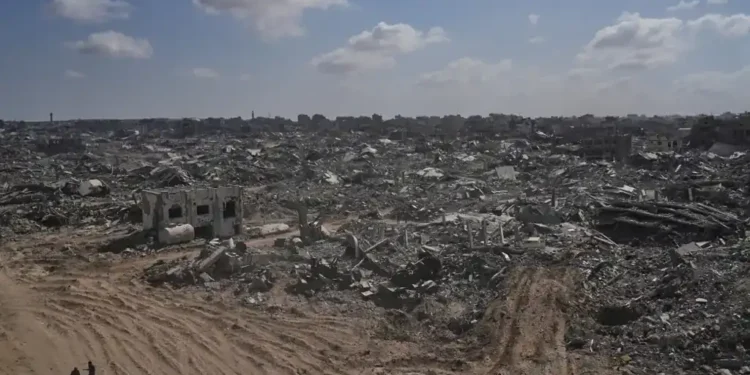 Gaza Ceasefire Holds as Palestinians Return to Ruins, Hostage Release Expected Monday - AP Photo/Abdel Kareem Hana