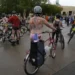 Portland Protesters Stage Naked Bike Ride to Oppose Federal Troop Deployment - AP Photo/Jenny Kane