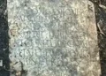 Lost Roman Gravestone Discovered in New Orleans Backyard After 80 Years Missing - Susann Lusnia via AP