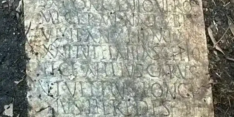 Lost Roman Gravestone Discovered in New Orleans Backyard After 80 Years Missing - Susann Lusnia via AP