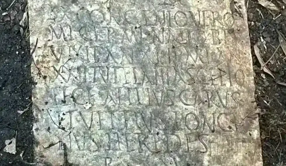 Lost Roman Gravestone Discovered in New Orleans Backyard After 80 Years Missing - Susann Lusnia via AP