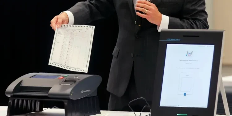 U.S. Charges Smartmatic with $1M Bribery Scheme Tied to Philippine Elections - Bob Andres/Atlanta Journal-Constitution via AP, File