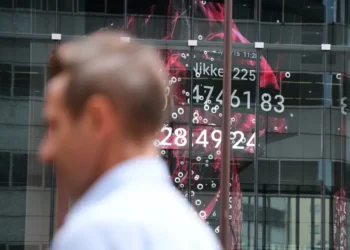 Global Stocks Slide as Bank Loan Fears and Trade Tensions Deepen - AP Photo/Eugene Hoshiko