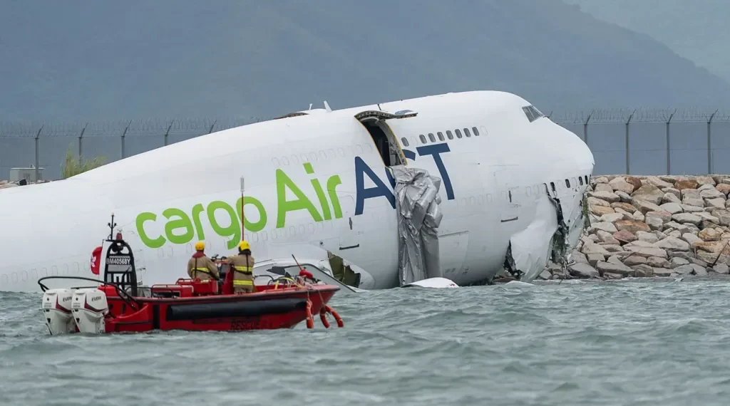 Cargo Plane Skids Off Hong Kong Runway Into Sea, Killing Two Workers - AP Photo/Chan Long Hei