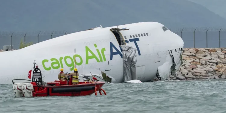 Cargo Plane Skids Off Hong Kong Runway Into Sea, Killing Two Workers - AP Photo/Chan Long Hei