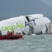Cargo Plane Skids Off Hong Kong Runway Into Sea, Killing Two Workers - AP Photo/Chan Long Hei