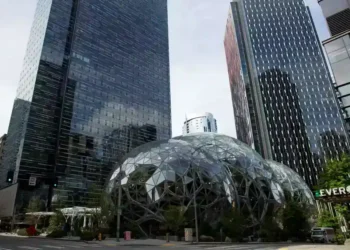 Amazon Cuts 14,000 Jobs as AI Transformation Accelerates - Lindsey Wasson/Getty Images/File