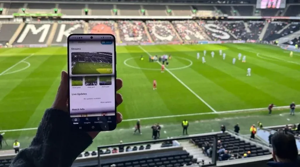 Fans using mobile devices with enhanced stadium connectivity - Weaver Labs/BBC