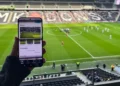 Fans using mobile devices with enhanced stadium connectivity - Weaver Labs/BBC
