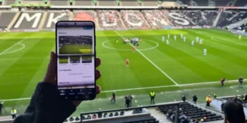 Fans using mobile devices with enhanced stadium connectivity - Weaver Labs/BBC