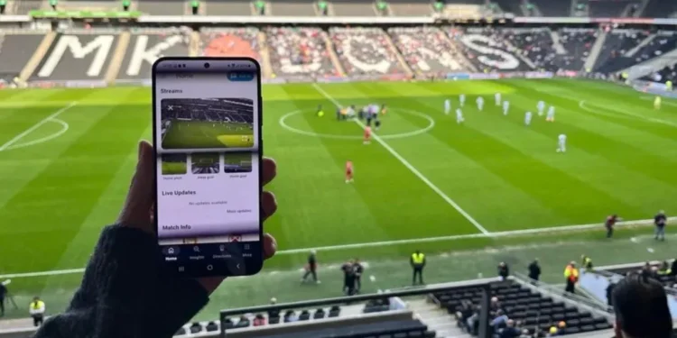 Fans using mobile devices with enhanced stadium connectivity - Weaver Labs/BBC