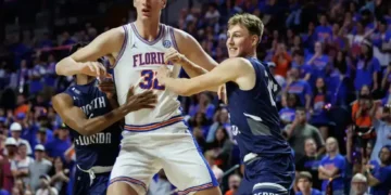 World’s Tallest Teen Olivier Rioux Makes Historic NCAA Basketball Debut at Florida - AP Photo/Chris Watkins