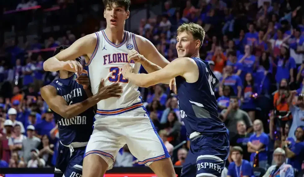 World’s Tallest Teen Olivier Rioux Makes Historic NCAA Basketball Debut at Florida - AP Photo/Chris Watkins