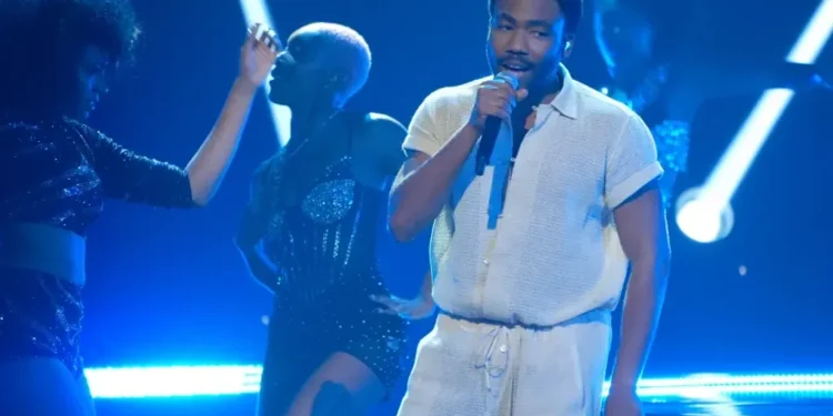 Donald Glover speaks onstage at a Los Angeles music festival. - AP Photo/Chris Pizzello, File